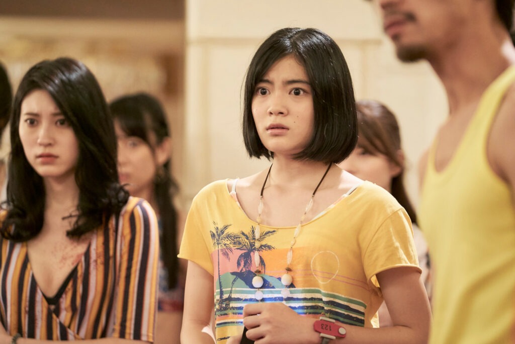 A dramatic poster for Alice in Borderland Season 4 featuring Arisu, Usagi, and another survivor standing against a dark red cityscape. The atmosphere is tense and cinematic, with bold text “Alice in Borderland Season 4” above them, symbolizing mystery, survival, and suspense.